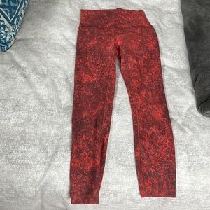 Lululemon leggings. Size 4. Red patterned. Gently used
